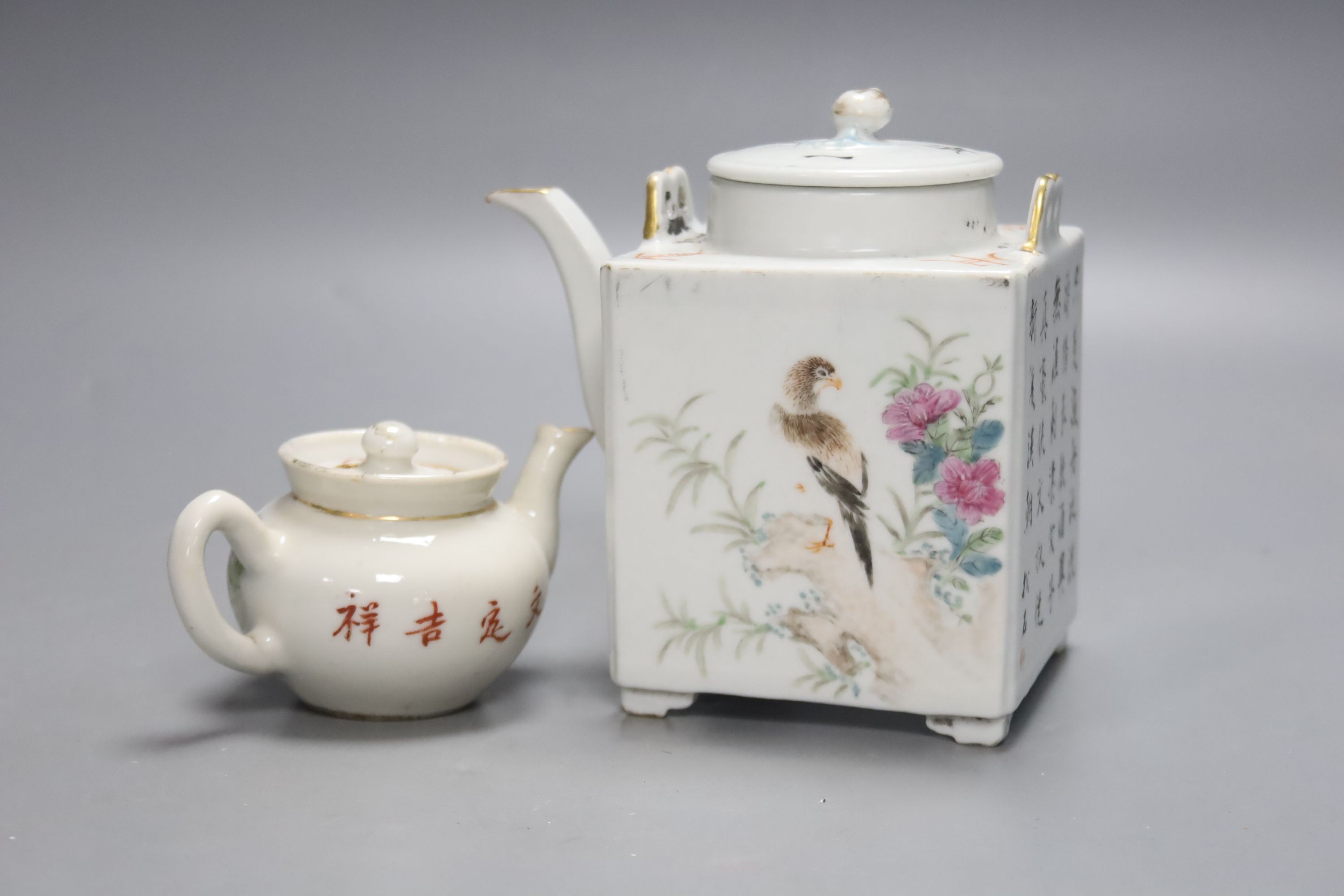 A Chinese enamelled porcelain square teapot and cover and a similar miniature teapot and cover, tallest 13cm